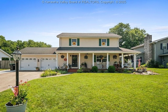 128 Westland Ests, Winfield, WV 25213 - view of front of property with a porch, a garage, and concrete driveway