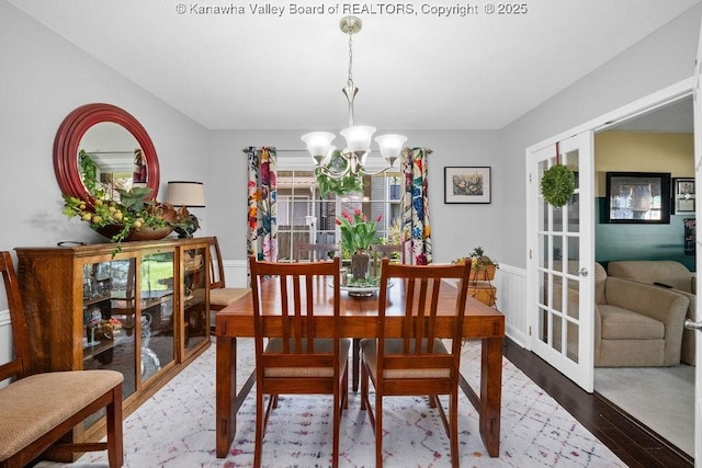 128 Westland Ests, Winfield, WV 25213 - dining space with a chandelier and wood finished floors