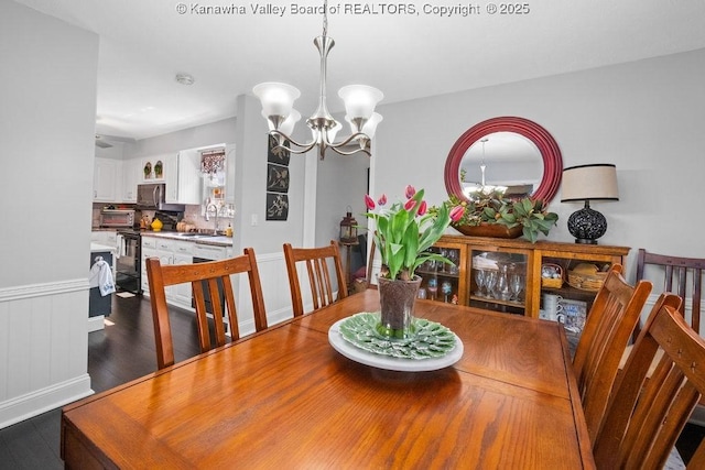 128 Westland Ests, Winfield, WV 25213 - dining area featuring a chandelier and wood finished floors