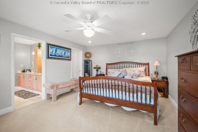 128 Westland Ests, Winfield, WV 25213 - bedroom with light carpet, recessed lighting, ensuite bath, and ceiling fan
