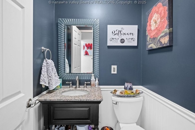 128 Westland Ests, Winfield, WV 25213 - bathroom featuring a wainscoted wall and vanity