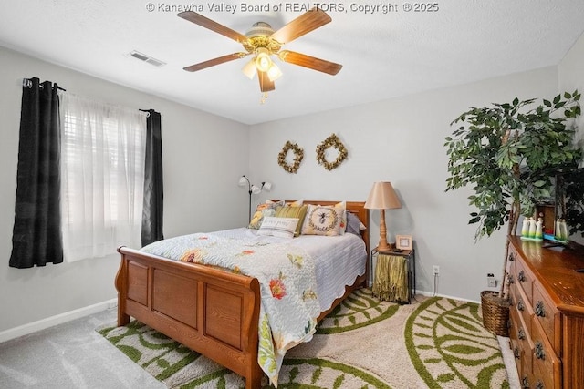 128 Westland Ests, Winfield, WV 25213 - bedroom with light colored carpet and a ceiling fan