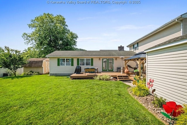 128 Westland Ests, Winfield, WV 25213 - rear view of house featuring a gazebo, a deck, a shed, a chimney, and a yard