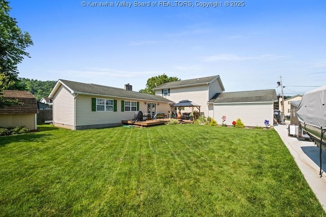 128 Westland Ests, Winfield, WV 25213 - rear view of property with a gazebo, a deck, a yard, and an outbuilding