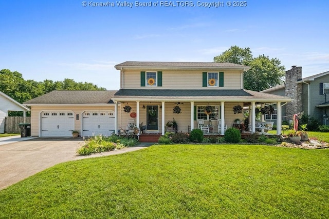 128 Westland Ests, Winfield, WV 25213 - view of front facade with an attached garage, a porch, and driveway