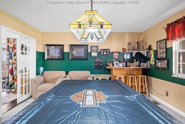 128 Westland Ests, Winfield, WV 25213 - bedroom with a bar and baseboards
