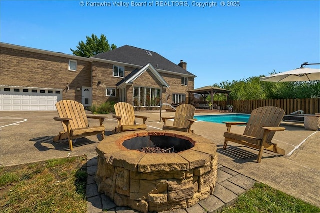 52 Cedar Dr, Hurricane, WV 25526 - view of pool featuring an outdoor fire pit, a gazebo, and a patio area