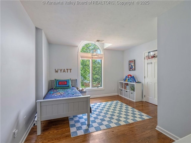 52 Cedar Dr, Hurricane, WV 25526 - bedroom with wood finished floors and baseboards