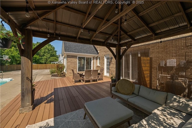 52 Cedar Dr, Hurricane, WV 25526 - wooden deck with a gazebo, outdoor dining area, and an outdoor living space