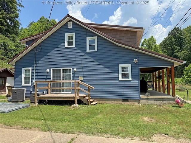 1255 Johns Creek Rd, Milton, WV 25541 - back of property with a yard and a deck