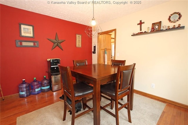 1255 Johns Creek Rd, Milton, WV 25541 - dining room with wood finished floors and baseboards