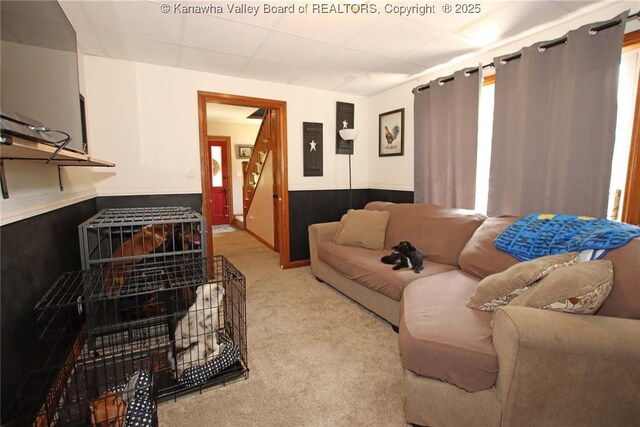 1255 Johns Creek Rd, Milton, WV 25541 - living room with light carpet, a paneled ceiling, and stairs