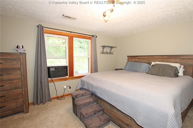 1255 Johns Creek Rd, Milton, WV 25541 - bedroom featuring a textured ceiling, carpet flooring, and cooling unit