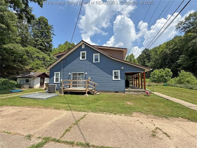 1255 Johns Creek Rd, Milton, WV 25541 - back of house with a yard, crawl space, and a deck