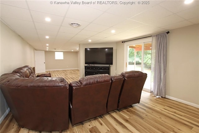 1412 Wilkie Dr, Charleston, WV 25314 - living room featuring light wood-style floors, a paneled ceiling, and recessed lighting