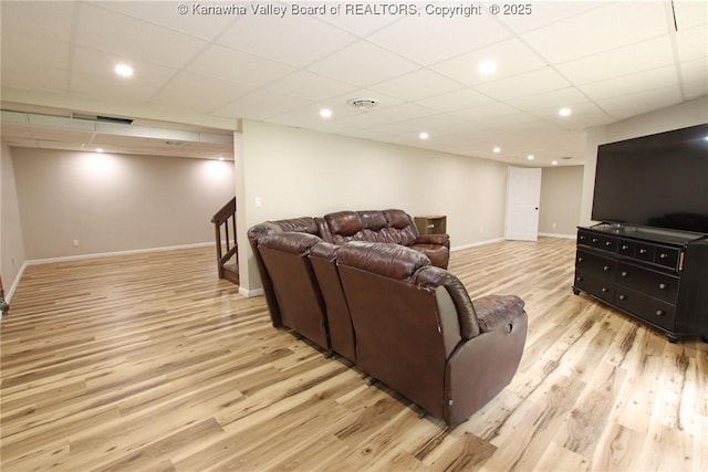 1412 Wilkie Dr, Charleston, WV 25314 - living area featuring wood finished floors, a drop ceiling, and stairs