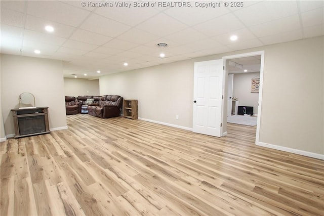 1412 Wilkie Dr, Charleston, WV 25314 - living room with light wood-style floors, a drop ceiling, and recessed lighting