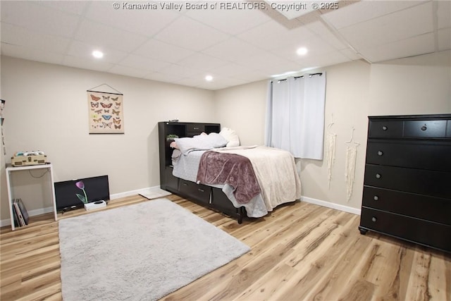 1412 Wilkie Dr, Charleston, WV 25314 - bedroom with light wood-style flooring, a drop ceiling, and recessed lighting
