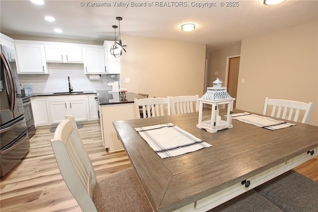 1412 Wilkie Dr, Charleston, WV 25314 - dining area featuring light wood-type flooring and recessed lighting
