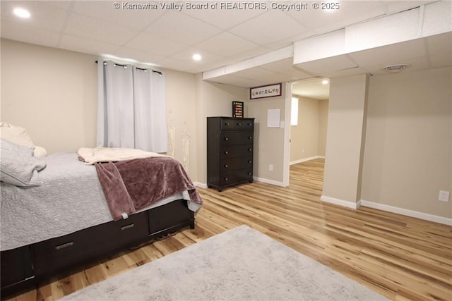 1412 Wilkie Dr, Charleston, WV 25314 - bedroom with wood finished floors, a paneled ceiling, and recessed lighting