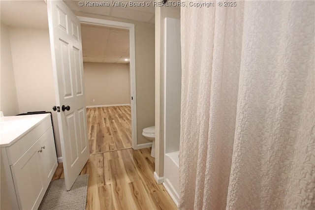 1412 Wilkie Dr, Charleston, WV 25314 - bathroom with wood finished floors, vanity, and shower / tub combo