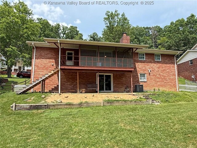 1412 Wilkie Dr, Charleston, WV 25314 - rear view of property featuring brick siding, a chimney, stairs, and a sunroom