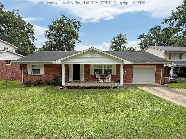 1412 Wilkie Dr, Charleston, WV 25314 - view of front of property with a porch, a garage, brick siding, and concrete driveway