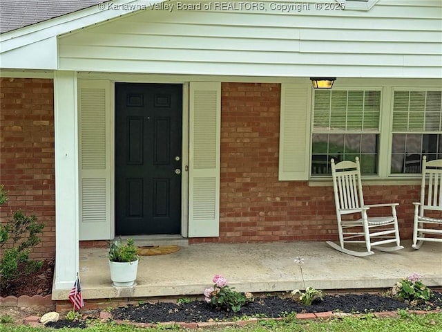 1412 Wilkie Dr, Charleston, WV 25314 - view of exterior entry featuring brick siding