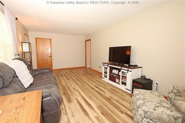 1412 Wilkie Dr, Charleston, WV 25314 - living area with wood finished floors and baseboards