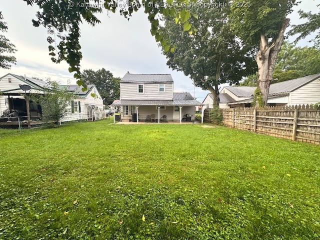 191 N Park Dr, Point Pleasant, WV 25550 - back of house featuring a fenced backyard and a metal roof