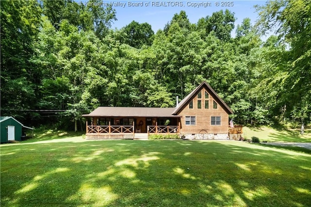 180 Tryphenia Rd, Hurricane, WV 25526 - log home featuring a porch, a front yard, crawl space, and a storage shed