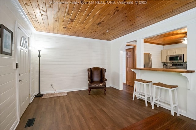 180 Tryphenia Rd, Hurricane, WV 25526 - sitting room featuring wood ceiling, crown molding, dark wood-type flooring, arched walkways, and ceiling fan