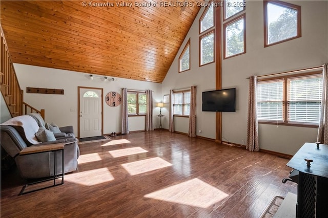 180 Tryphenia Rd, Hurricane, WV 25526 - living room featuring high vaulted ceiling, stairway, wood finished floors, wooden ceiling, and healthy amount of natural light