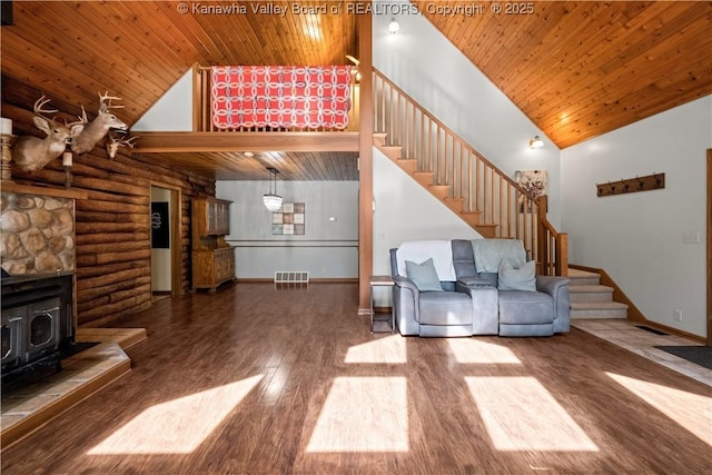 180 Tryphenia Rd, Hurricane, WV 25526 - unfurnished living room with high vaulted ceiling, wooden ceiling, stairs, a wood stove, and wood finished floors