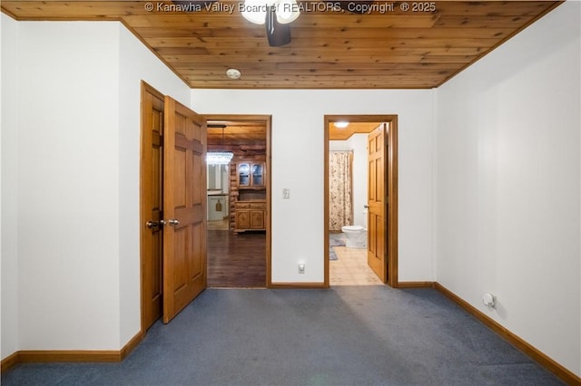 180 Tryphenia Rd, Hurricane, WV 25526 - unfurnished bedroom with wooden ceiling, carpet flooring, and ensuite bath