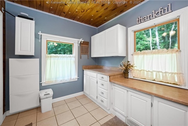 180 Tryphenia Rd, Hurricane, WV 25526 - laundry room featuring plenty of natural light, light tile patterned floors, wooden ceiling, and crown molding