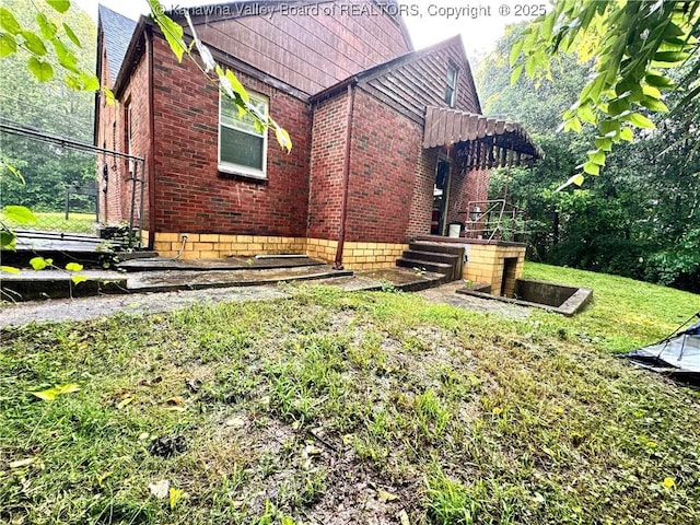 17739 US Route 60, Culloden, WV 25510 - view of home's exterior featuring brick siding