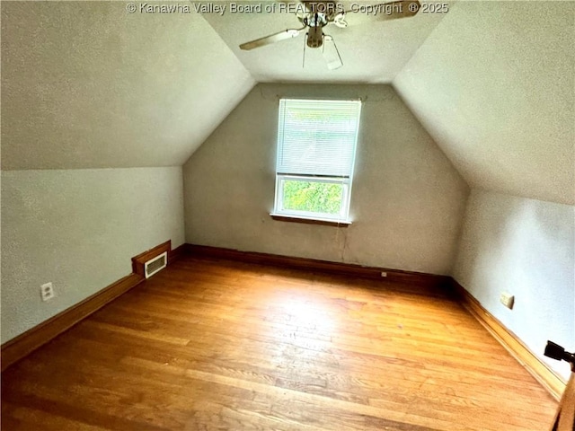 17739 US Route 60, Culloden, WV 25510 - bonus room with wood finished floors, a ceiling fan, a textured ceiling, and lofted ceiling