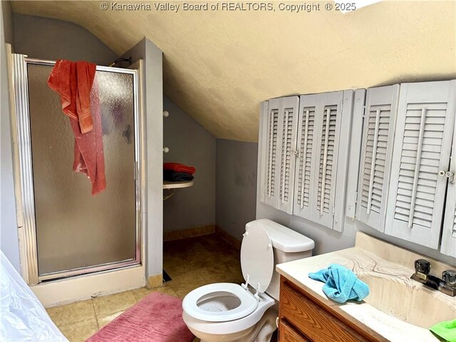 17739 US Route 60, Culloden, WV 25510 - bathroom with vaulted ceiling, a shower stall, vanity, and tile patterned flooring