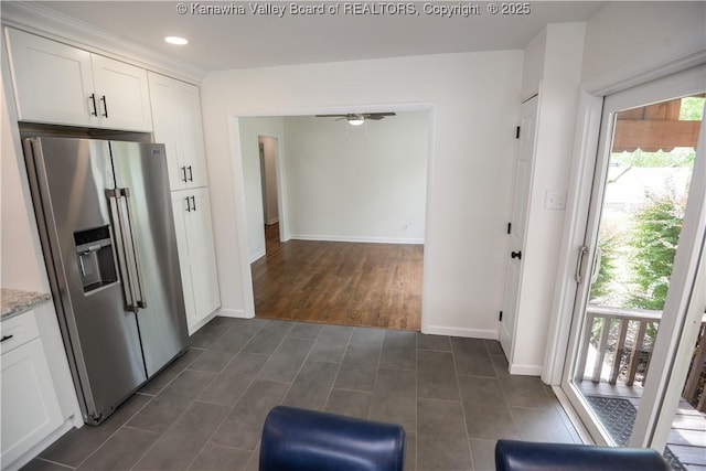 1516 Fenton Cir, Nitro, WV 25143 - kitchen featuring high quality fridge, healthy amount of natural light, white cabinets, light stone countertops, and recessed lighting
