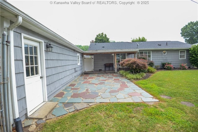 1516 Fenton Cir, Nitro, WV 25143 - back of house featuring a patio area and a yard