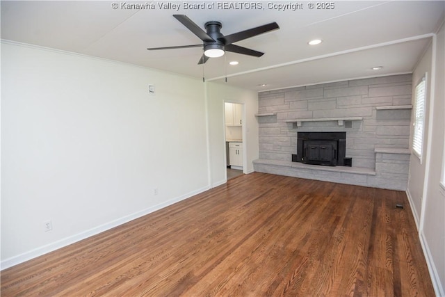 1516 Fenton Cir, Nitro, WV 25143 - unfurnished living room featuring a ceiling fan, wood finished floors, recessed lighting, ornamental molding, and a fireplace