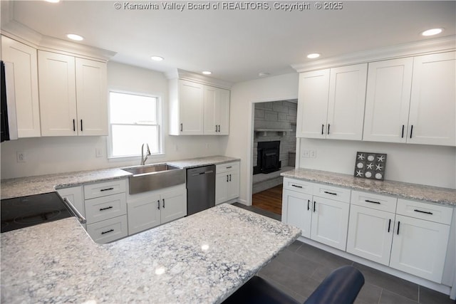 1516 Fenton Cir, Nitro, WV 25143 - kitchen with dishwasher, electric range, white cabinets, recessed lighting, and light stone countertops