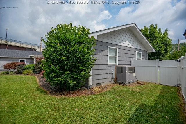 1516 Fenton Cir, Nitro, WV 25143 - rear view of house with crawl space and a gate