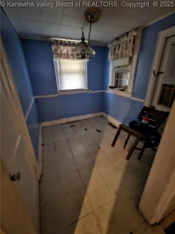 521 Roane St, Charleston, WV 25302 - unfurnished dining area with a paneled ceiling and cooling unit