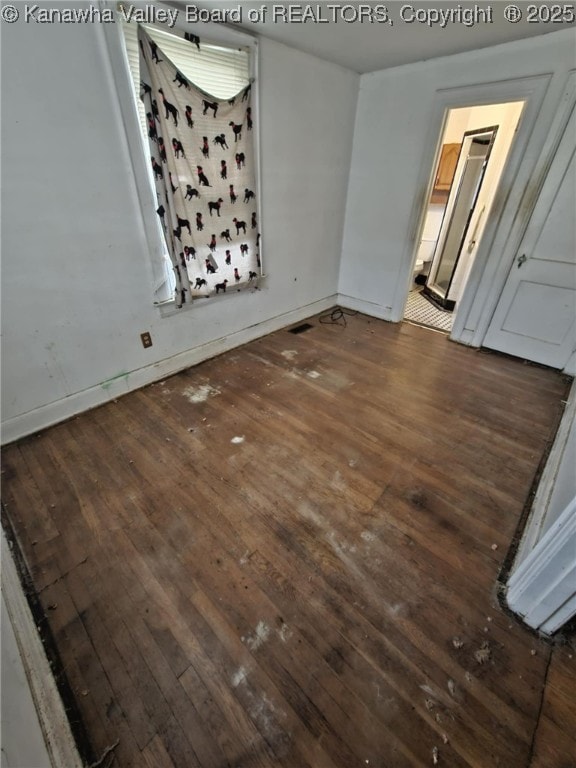 521 Roane St, Charleston, WV 25302 - unfurnished room featuring dark wood-style floors and baseboards