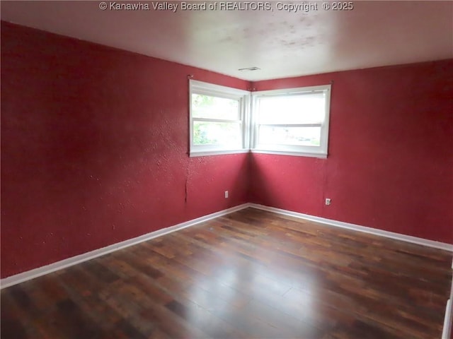 4808 Kentucky St, South Charleston, WV 25309 - spare room featuring wood finished floors and baseboards