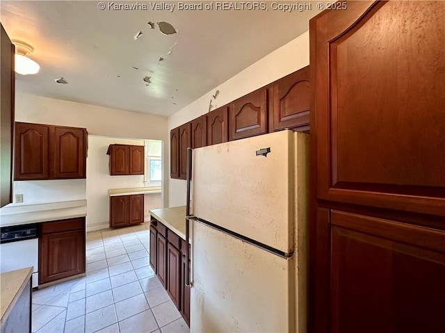 5430 Virginia Ave SE, Charleston, WV 25304 - kitchen with white appliances, light tile patterned flooring, and light countertops
