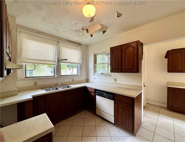 5430 Virginia Ave SE, Charleston, WV 25304 - kitchen with white dishwasher, light tile patterned flooring, and light countertops