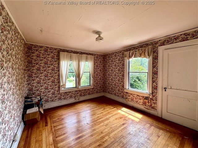 5430 Virginia Ave SE, Charleston, WV 25304 - empty room with light wood-style floors and wallpapered walls